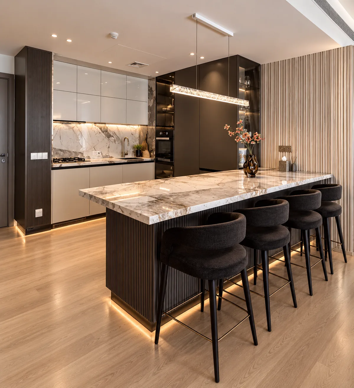 Kitchen island with marble top and black bar stools, Dubai Harbour